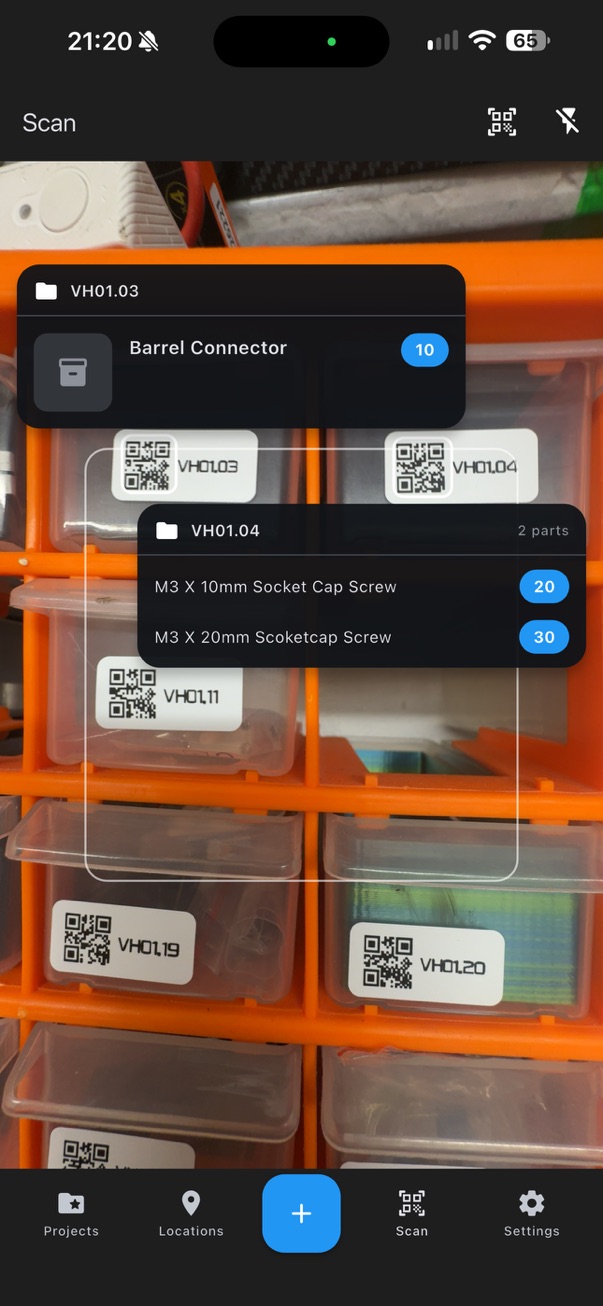 Live scan screen pointed at a cabinet of drawers, with a popup showing a scanned drawer's contents (Barrel Connector, qty 10) and a second popup for an adjacent drawer (M3 x 10mm Socket Cap Screw, M3 x 20mm Socket Cap Screw)